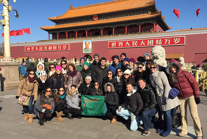 Students studying abroad in Beijing, China pose outside Tiananmen Square