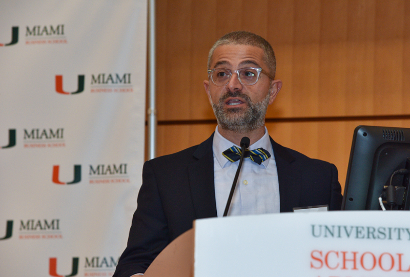 A professor speaks at the Miami Behavioral Finance Conference