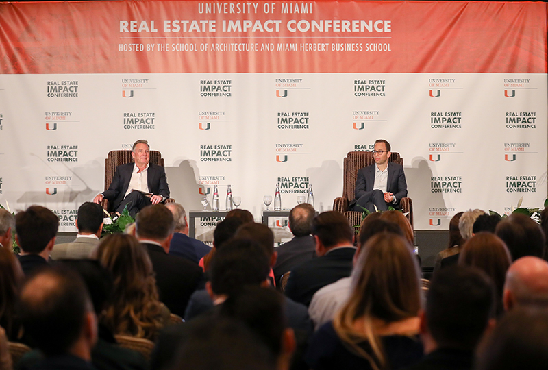 2 men on a real estate panel