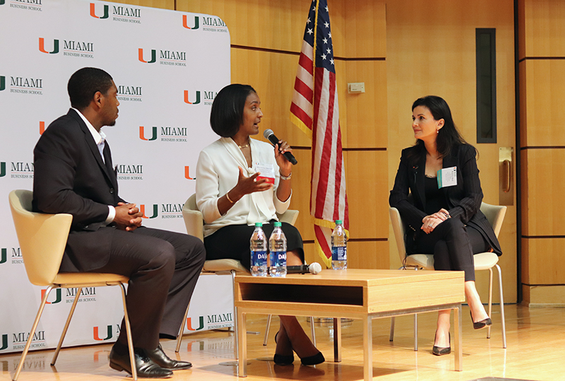 3 people talking on a panel