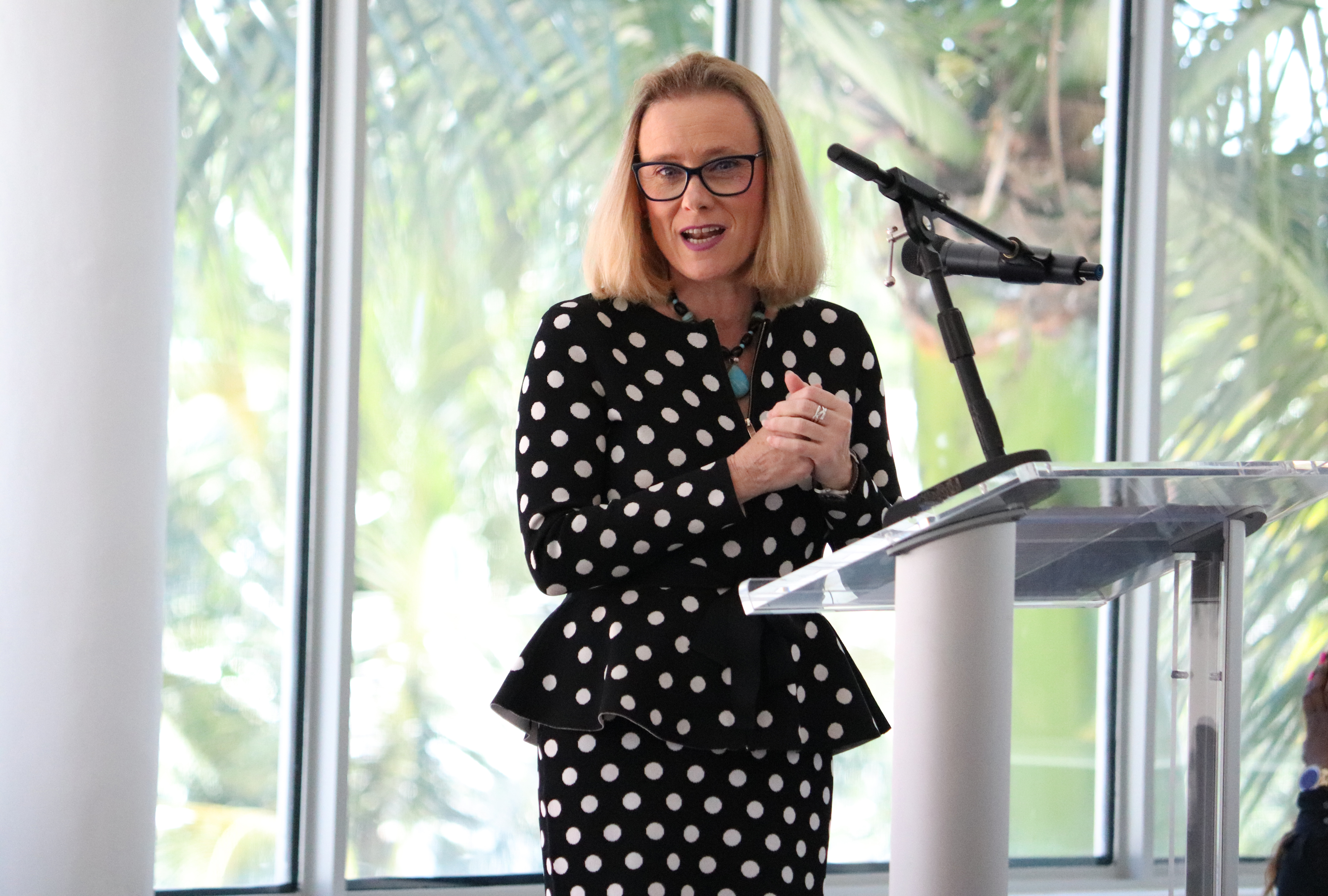 woman in a polka dot suit